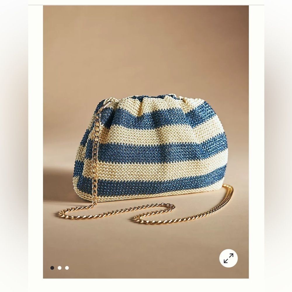 The Frankie Raffia Clutch
By Anthropologie